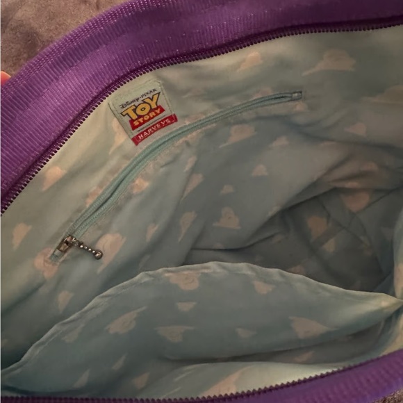 Harveys Striped Backpack in Green, Purple, and Silver - Picture 3 of 3